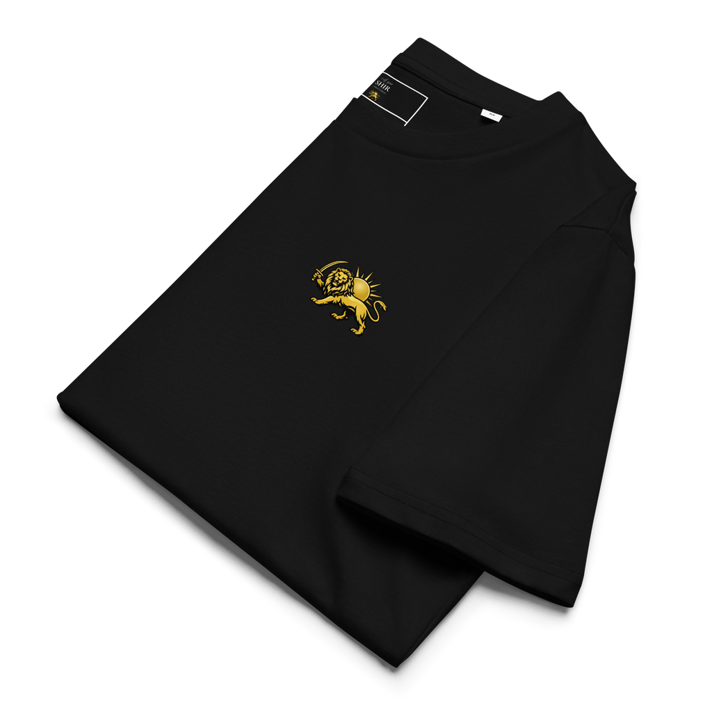 A folded black crewneck sweatshirt with a small yellow embroidered shirokhorshid graphic on the chest.