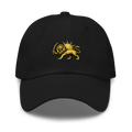 A black baseball cap featuring a gold embroidered lion and sun graphic on the front, displayed against a clean white background.